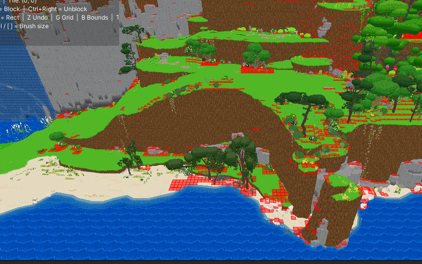 Angled view of the ocean zone showing the beach, cliffs, and coastline with red blocked tiles painted over decorative rocks and cliff edges